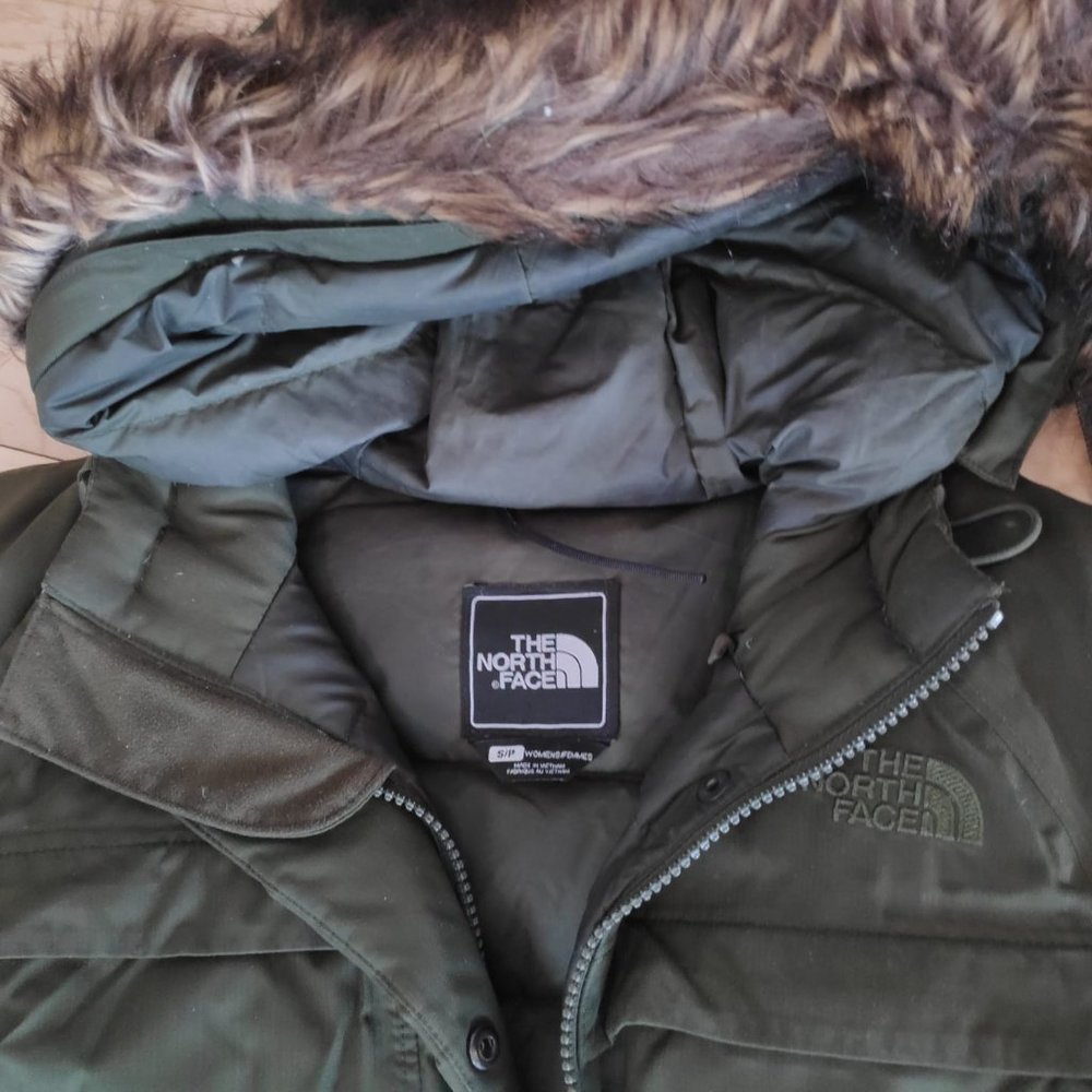 dark green North Face down parka